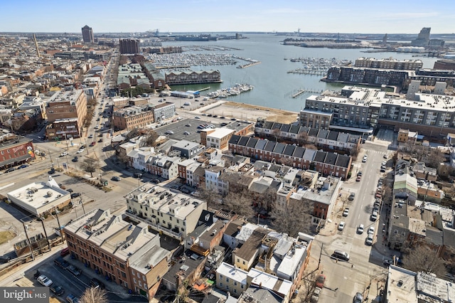 bird's eye view featuring a view of city and a water view