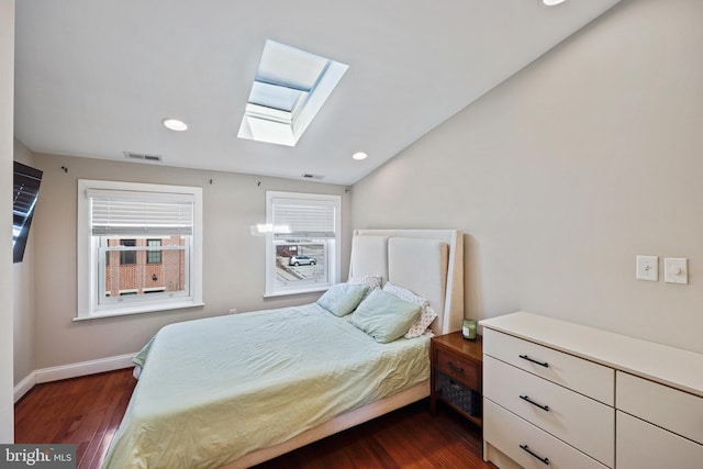 bedroom with dark wood-type flooring, recessed lighting, visible vents, and baseboards