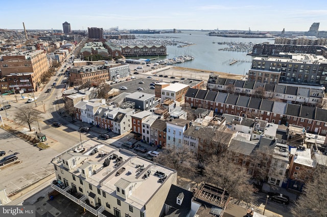 aerial view featuring a water view and a city view