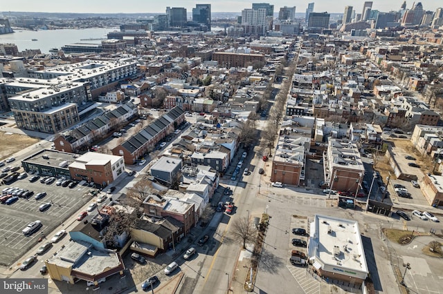 birds eye view of property with a view of city