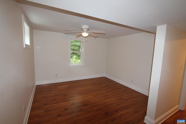 unfurnished room with ceiling fan, baseboards, and wood finished floors