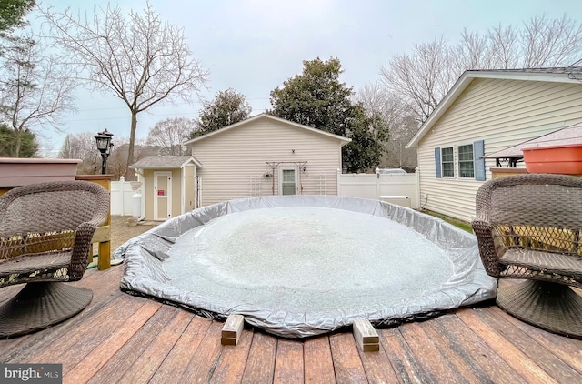 wooden deck featuring fence