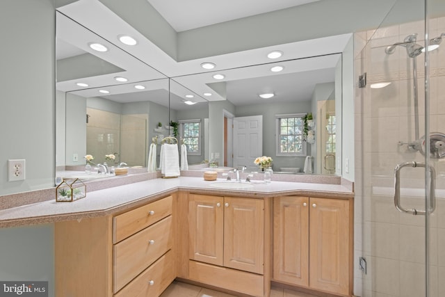 full bathroom with recessed lighting, tile patterned flooring, vanity, and a shower stall