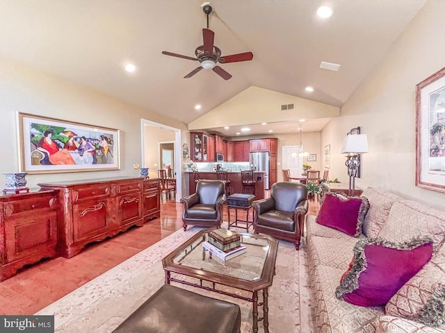 living area featuring lofted ceiling, recessed lighting, visible vents, and a ceiling fan