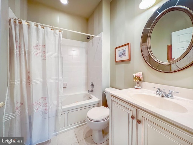 bathroom with shower / bathtub combination with curtain, vanity, toilet, and tile patterned floors