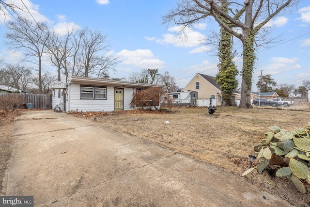 view of front of house with fence