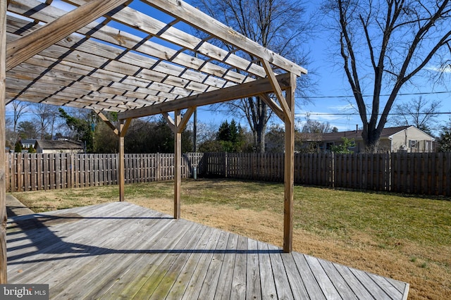 wooden deck featuring a fenced backyard, a pergola, and a lawn