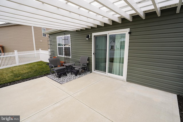 view of patio / terrace with fence and a pergola