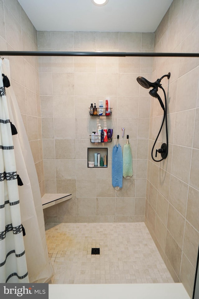 bathroom with a stall shower