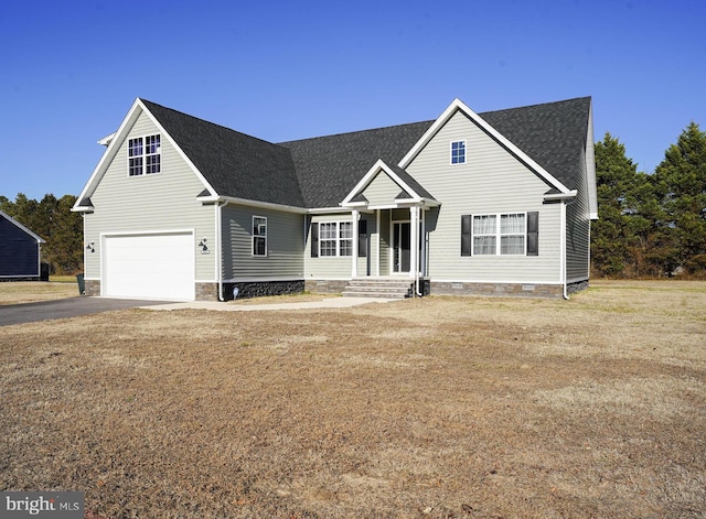 traditional-style house with crawl space, a front yard, aphalt driveway, and roof with shingles