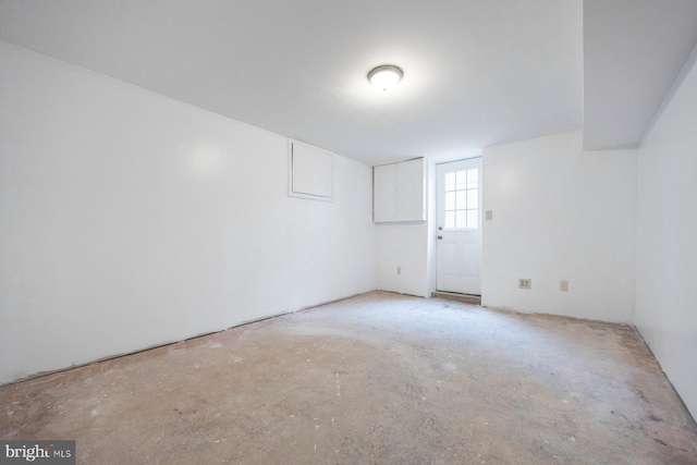 spare room featuring concrete flooring