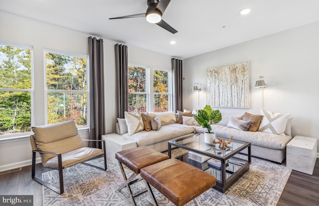 living room with recessed lighting, visible vents, ceiling fan, and wood finished floors