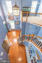 stairs with wood finished floors