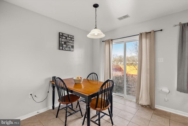 dining room featuring visible vents, baseboards, and light tile patterned flooring