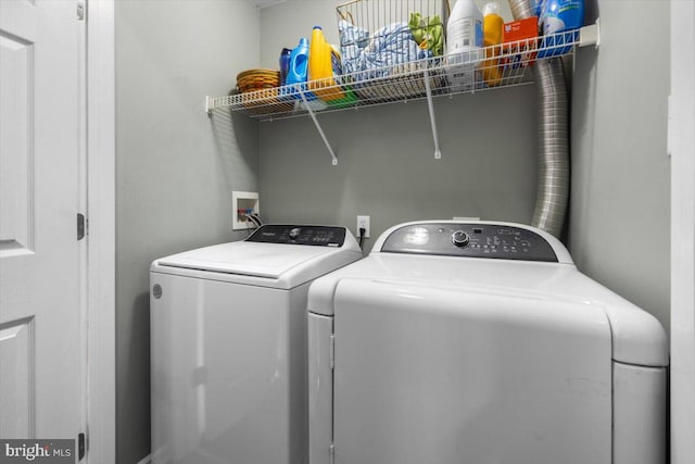 laundry room with laundry area and washer and dryer