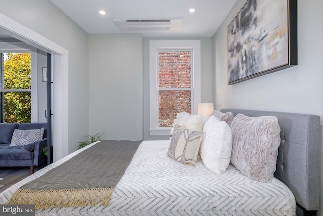 bedroom with recessed lighting and visible vents