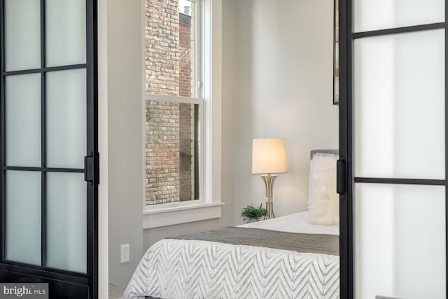 bedroom featuring multiple windows