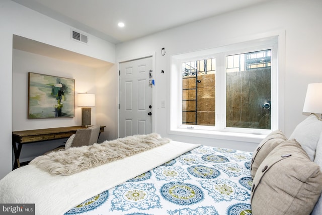 bedroom with visible vents and recessed lighting