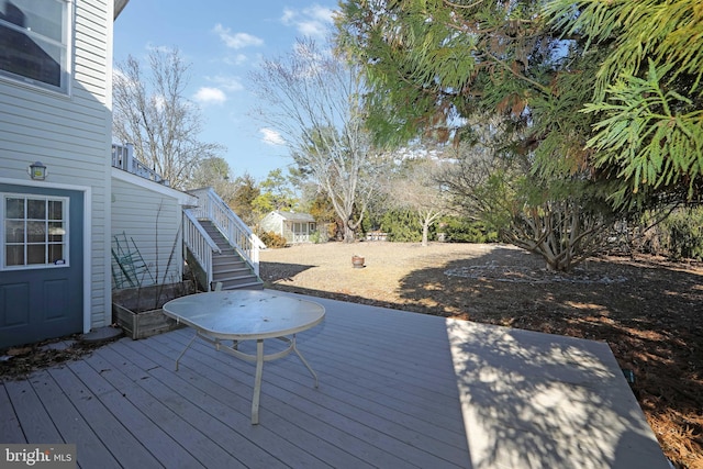 deck featuring stairway