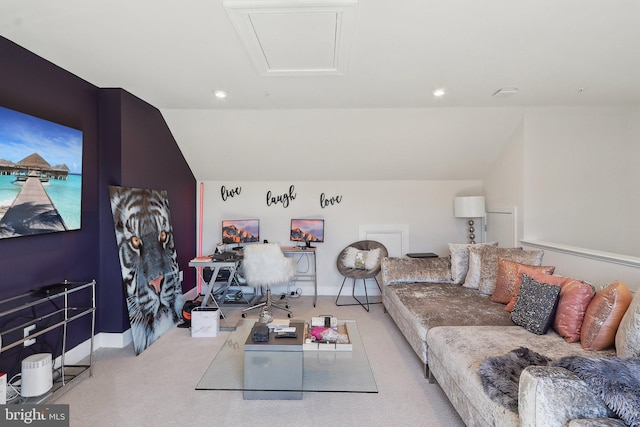 interior space featuring lofted ceiling, recessed lighting, and baseboards