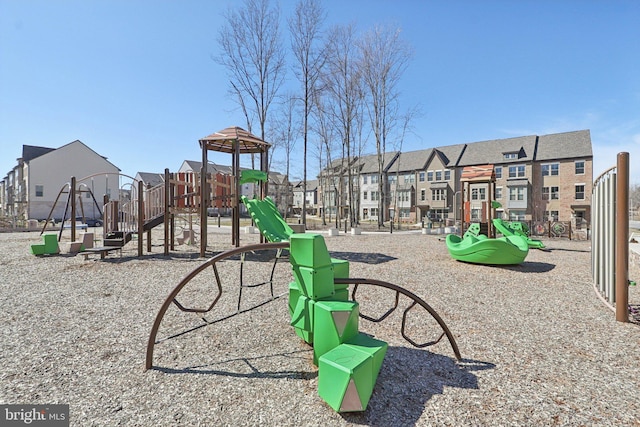 community jungle gym featuring a residential view