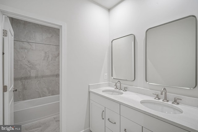 full bath with shower / bathtub combination, double vanity, and a sink