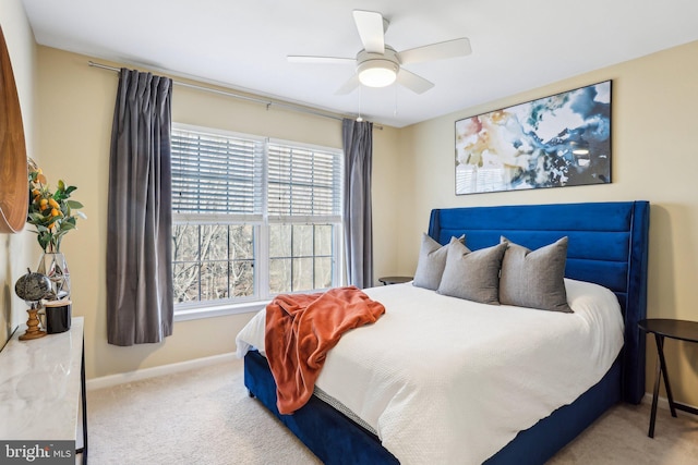 bedroom featuring carpet flooring, a ceiling fan, and baseboards