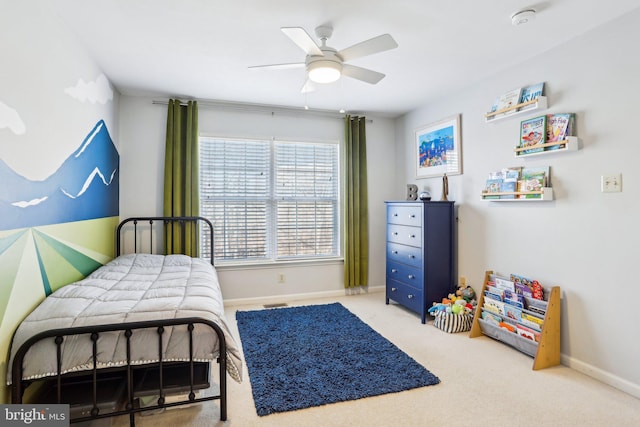 bedroom featuring carpet floors, ceiling fan, and baseboards