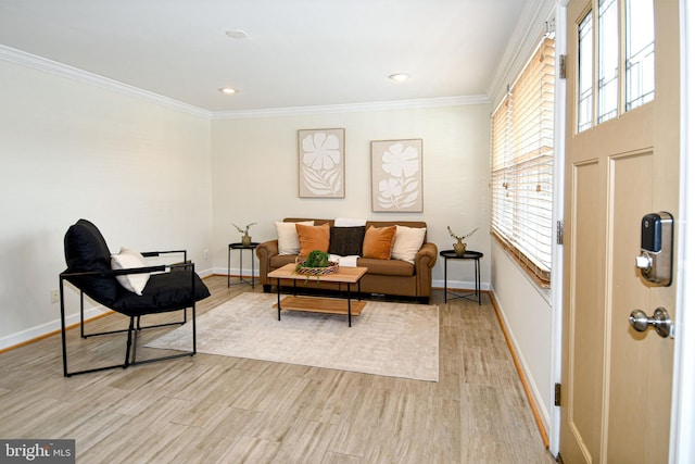 living area with ornamental molding, light wood-type flooring, recessed lighting, and baseboards