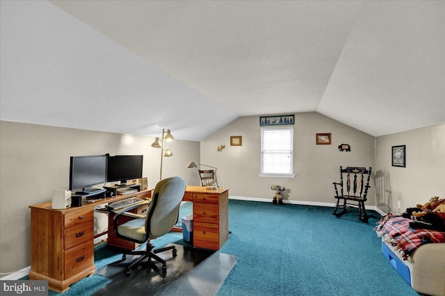 home office featuring lofted ceiling, carpet flooring, and baseboards