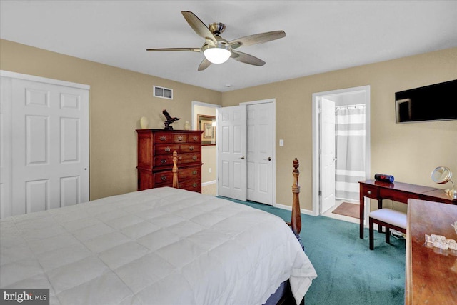 bedroom with a ceiling fan, visible vents, baseboards, carpet, and ensuite bath