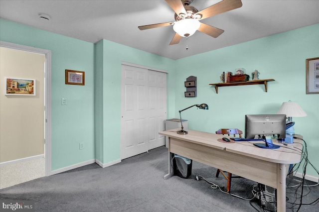 office with carpet, a ceiling fan, and baseboards