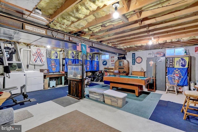 game room featuring washer and dryer, concrete floors, and billiards