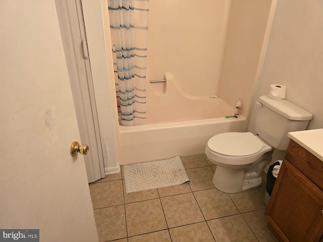 full bath with shower / bath combination with curtain, vanity, tile patterned flooring, and toilet