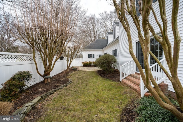 view of yard featuring a fenced backyard