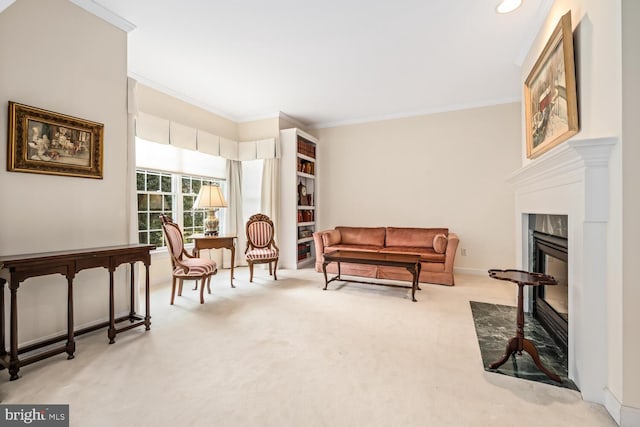 living area with carpet floors, crown molding, baseboards, and a premium fireplace