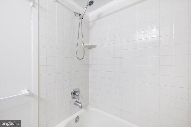 bathroom with shower / bathing tub combination