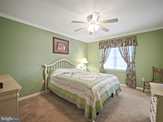 bedroom with carpet, baseboards, ceiling fan, and crown molding