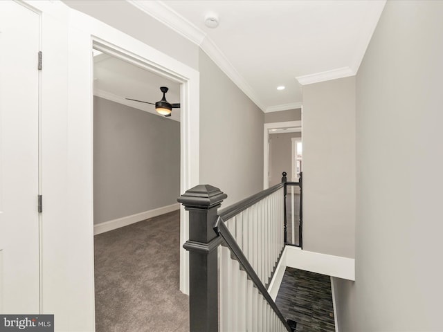 hall featuring an upstairs landing, ornamental molding, recessed lighting, carpet, and baseboards