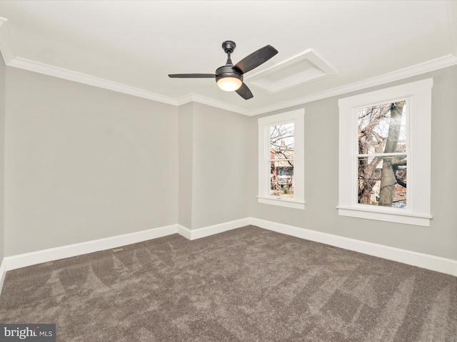 empty room with baseboards, a ceiling fan, ornamental molding, and dark carpet