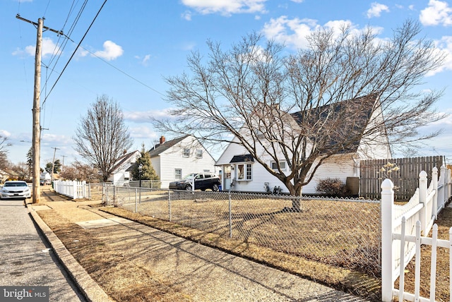 exterior space with a fenced front yard