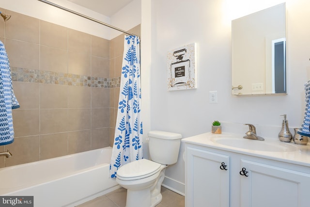 bathroom featuring tile patterned flooring, toilet, vanity, baseboards, and shower / bath combination with curtain