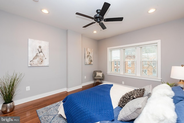 bedroom featuring ceiling fan, dark wood-type flooring, recessed lighting, and baseboards