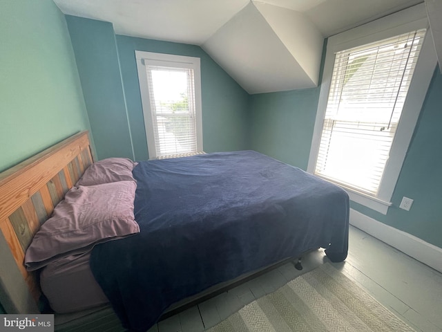 bedroom with vaulted ceiling