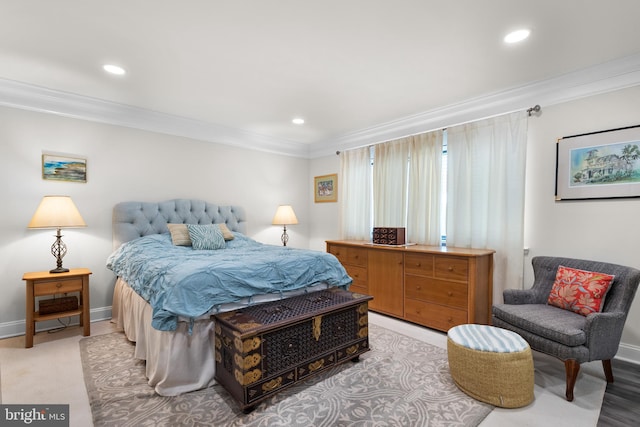 bedroom featuring ornamental molding, recessed lighting, and baseboards