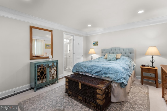 bedroom featuring recessed lighting, crown molding, baseboards, and ensuite bathroom