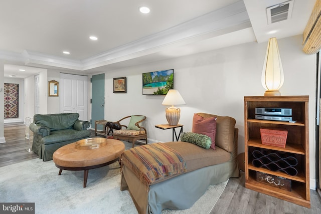 living room featuring recessed lighting, visible vents, and wood finished floors