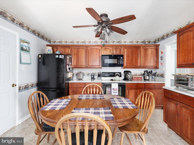 kitchen featuring a toaster, light countertops, brown cabinetry, a ceiling fan, and black appliances