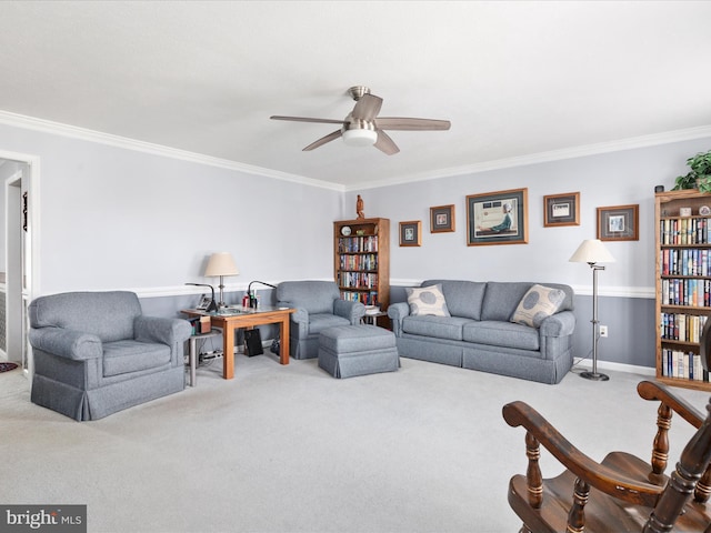 living area featuring a ceiling fan, crown molding, and light colored carpet