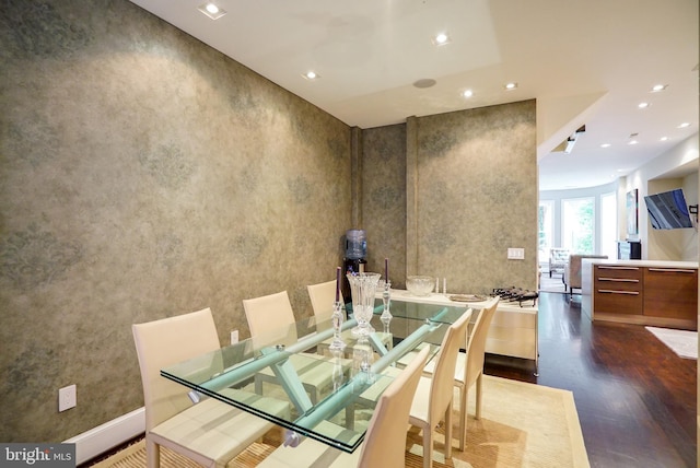 dining room featuring recessed lighting and dark wood-type flooring